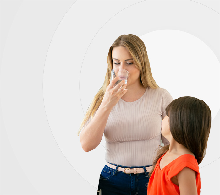 Mother and Daughter drinking water