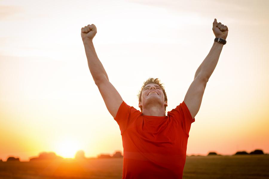 Confident man at sunset